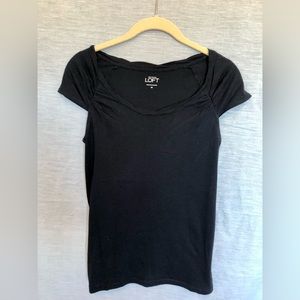 Ann Taylor Loft size S, navy blue t-shirt with shirred neckline and cap sleeves.